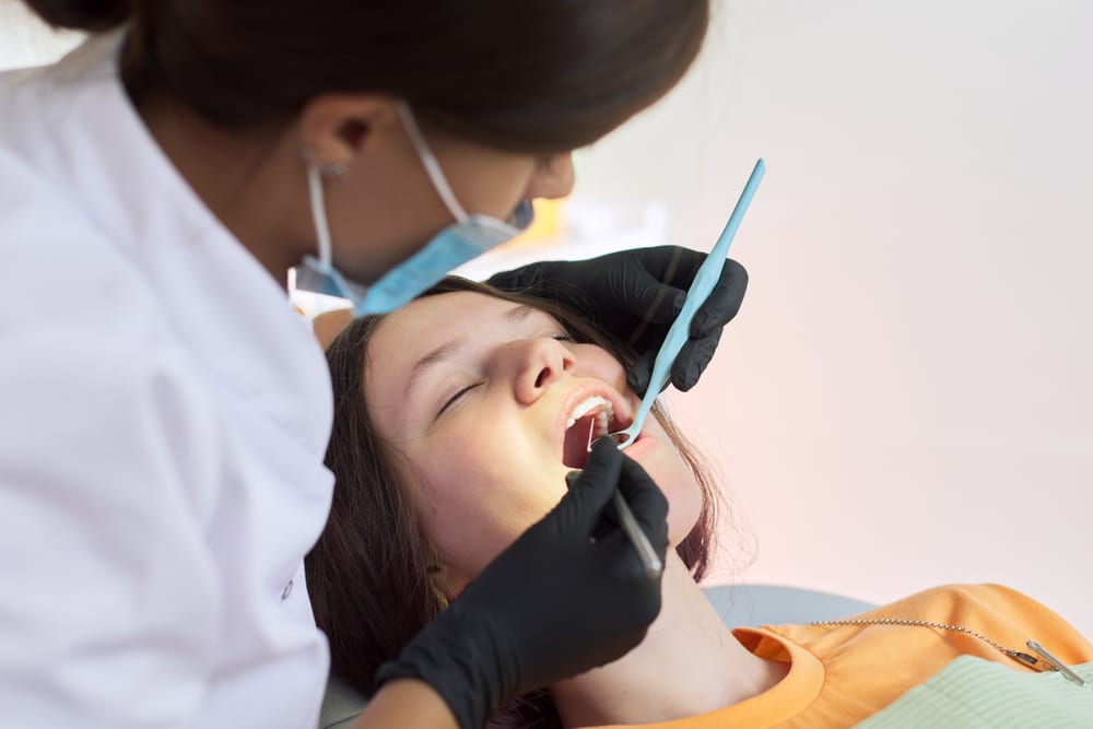 young girl sedated during dental work
